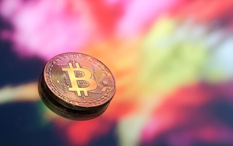 bitcoin-is-new-concept-virtual-money-colorful-background-coin-with-image-letter-b-close-up_169016-4709