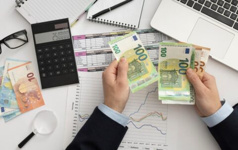 flat-lay-business-man-checking-finance-manners_23-2148793755