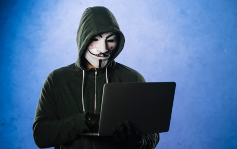 hacker-with-anonymous-mask_23-2147985390